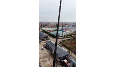 A Different Angle to Show How Hot Aggregate Buckets are Hoisted and Installed.